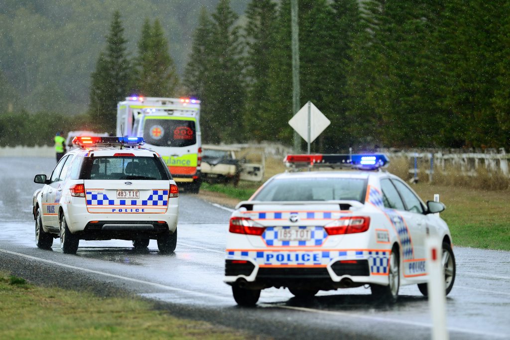 Ambulance paramedics assist a cyclist after they were struck by a vehicle while riding on Minden Lowood Road near Minden. Photo: David Nielsen / The Queensland Times Ambulance paramedics assist a cyclist after they were struck by a vehicle while riding on Minden Lowood Road near Minden. Photo: David Nielsen / The Queensland Times